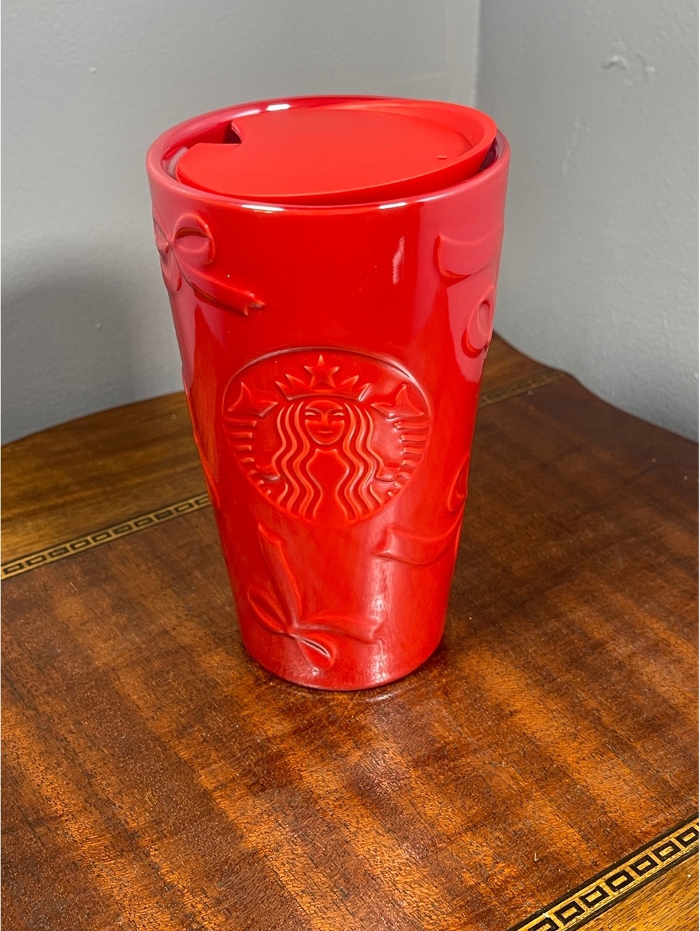 Starbucks Red Ceramic Travel Mug with Lid and Bow Design